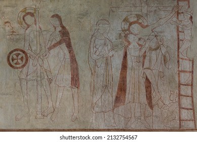 Descent from the Cross or Deposition of Christ an old fresco from the 1300s on the east wall in Orslev church, Denmark, August 9, 2021