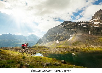 descent with mountain bike in the high mountains - Shutterstock ID 2087736967