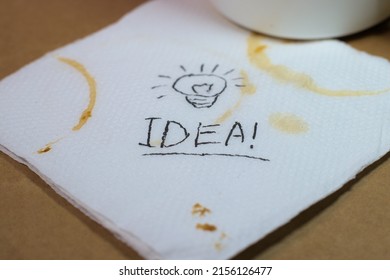 Describing Big Idea On A Coffee Stained Paper Napkin 