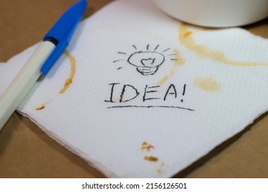 Describing Big Idea On A Coffee Stained Paper Napkin 