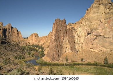 Desert Canyon With Winding River In Oregon