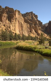 Desert Canyon With Winding River In Oregon