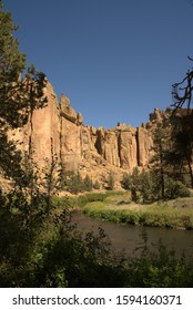 Desert Canyon With Winding River In Oregon