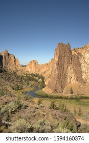 Desert Canyon With Winding River In Oregon