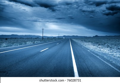 Desert Drive With Stormy Sky In Blue Color