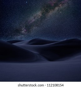 Desert Dunes Sand In Milky Way Stars Night Sky  [photo Illustration]