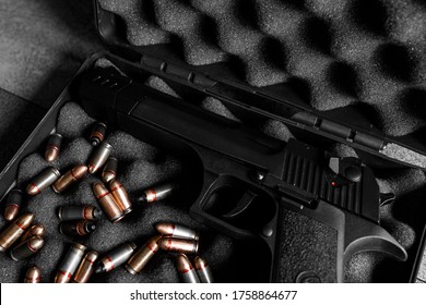 Desert Eagle Gun In Case On A Dark Background