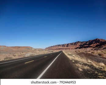Desert Highway And Arid Mountains