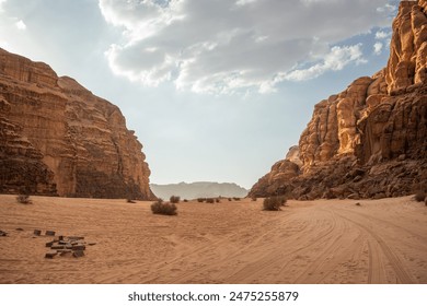 Desert Landscape with Rock Formation during Afternoon in Jordan. Beautiful Outdoor Scenery of Wadi Rum with Sandy Surface.