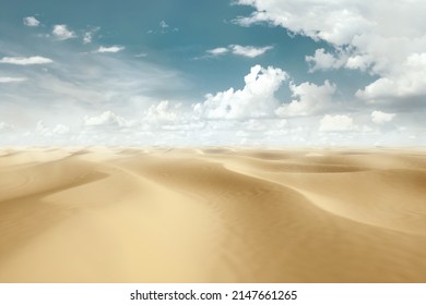 Desert Landscape. Sand Dunes Blue Sky. Drought, Stagnation, Lack Of Water