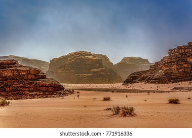 Desert landscape vista under blue hazy skies