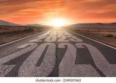 Desert landscape with the years 2022, 2023, 2024, 2025 and 2025 written on highway road  at the sunset - goals achieve - Concept for vision