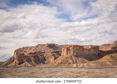 Desert Mountain Range With Cloudy Sky