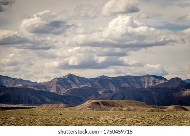 Desert Mountain Range With Cloudy Sky