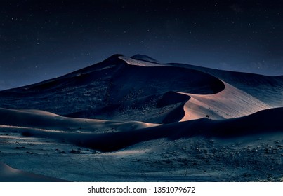 Desert Of Namib At Night With Orange Sand Dunes And Starry Sky.