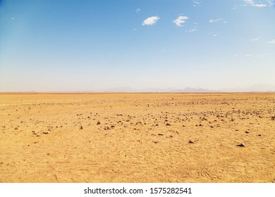 Desert on a background of mountains - Shutterstock ID 1575282541