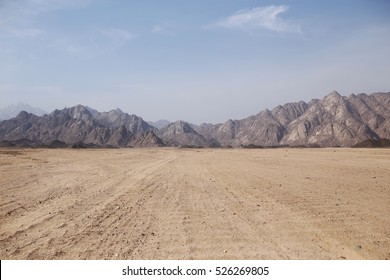 Desert on a background of mountains