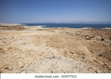 Desert on the shore of dead sea, gravel and dirt, sunny summer day