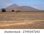 Desert plain with some mountains in the background on Sal Island, Cape Verde