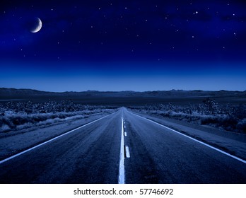 A desert road at night leading off into infinity. - Powered by Shutterstock