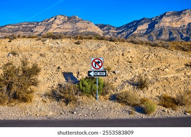 Desert Road Sign and Mountain Range View from Traveler's Perspective - Powered by Shutterstock