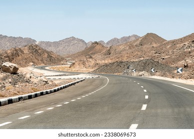 Desert road in Sinai moutain from luxor to kairo in Egypt