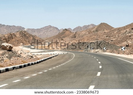 Desert road in Sinai moutain from luxor to kairo in Egypt