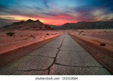 Desert Road At Sunset