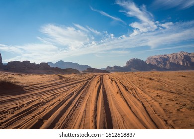 Desert Road In Wadi Rum, Jeep Traces In The Sand