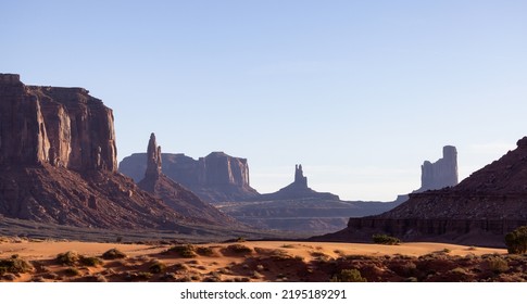 Desert Rocky Mountain American Landscape. Morning Sunny Sunrise Sky. Oljato-Monument Valley, Utah, United States. Nature Background