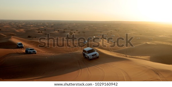Desert safari cars shows on\
Rub\' Al Khali desert in Dubai, United Arab Emirates, 20 June 2016. \
