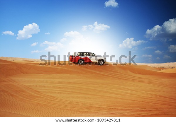 Desert safari with off road 4x4 car in sunlight\
       \
              