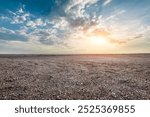 Desert sand ground and sky clouds natural landscape at sunset. car background.