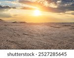 Desert sand ground and sky clouds natural landscape at sunset. car background.