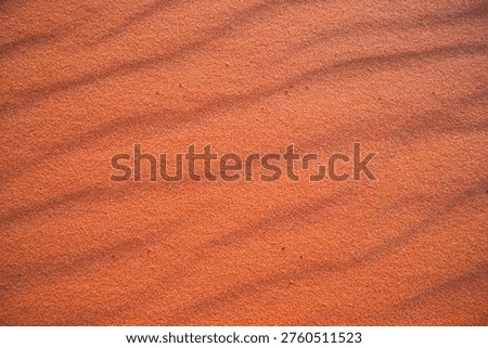 Desert Sand Patterns. Warmtoned Desert Surface Featuring Intricate Ripple Formations And Granular Detail
