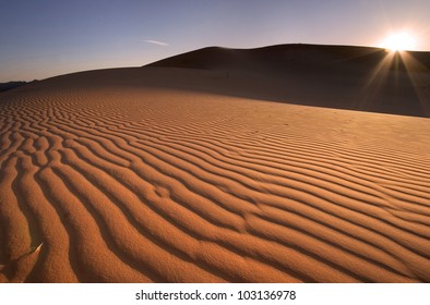 Desert Sand With Rising Sun