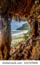 Deserted Beach Through Cave In Tonga