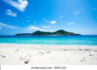 Deserted Coral Island On The Horizon