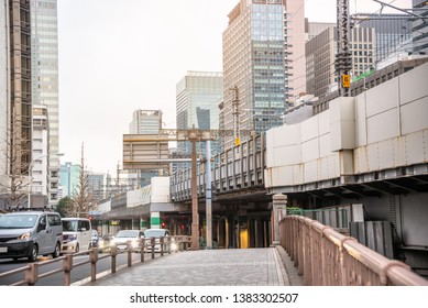 Deserted Pathway on a Bridge with an Elevated Railway Lane in background in Central Tokyo
