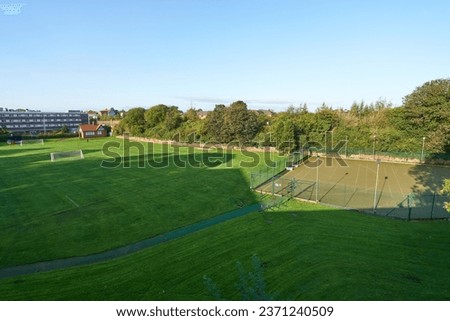 Deserted school playing fields example                       