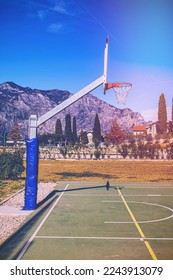 Deserted sports field on the shores of Lake Garda in Italy in faded color effect. - Shutterstock ID 2243913079