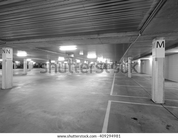 Deserted underground concrete car park, monochrome\
Melbourne 2016
