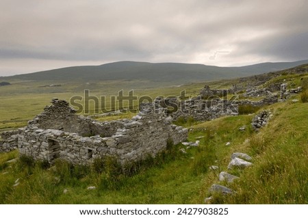 Deserted village at the base of slievemore mountain, believed to have been abandoned during the great famine, achill ireland, county mayo, connacht, republic of ireland (eire), europe