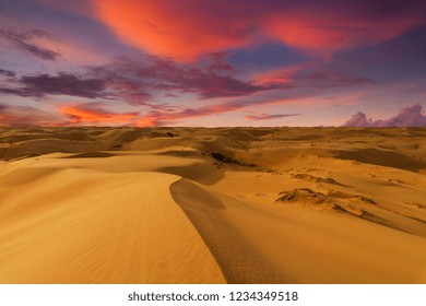 Deserts and Sand Dunes Landscape at Sunrise.
