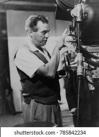 Desi Arnaz at a camera as executive producer of I LOVE LUCY TV series from 1952-57. Desilu Productions filmed the live performances with multiple sets and camera. Arnaz negotiated ownership and contro