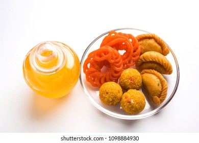 Desi Ghee With Indian Sweets Like Gujiya, Motichoor Laddu And Imarti Or Jalebi