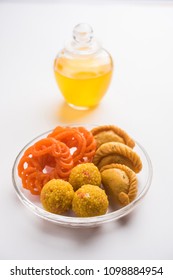 Desi Ghee With Indian Sweets Like Gujiya, Motichoor Laddu And Imarti Or Jalebi