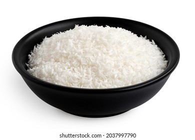 Desiccated Coconut In Black Ceramic Bowl Isolated On White.