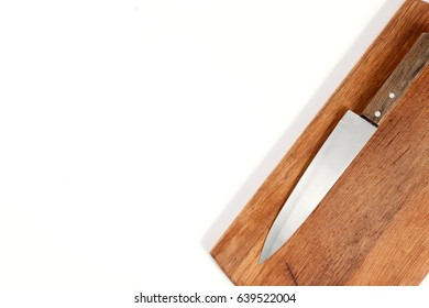 Design concept of mockup cutting board and knife set isolated on white background. Copyspace for text and logo. Clipping Path included on white background.