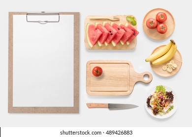 Design Concept Of Mockup Fresh Vegetable, Fruits And Clip Board Set Isolated On White Background. Copy Space For Text And Logo. Clipping Path Included On White Background.